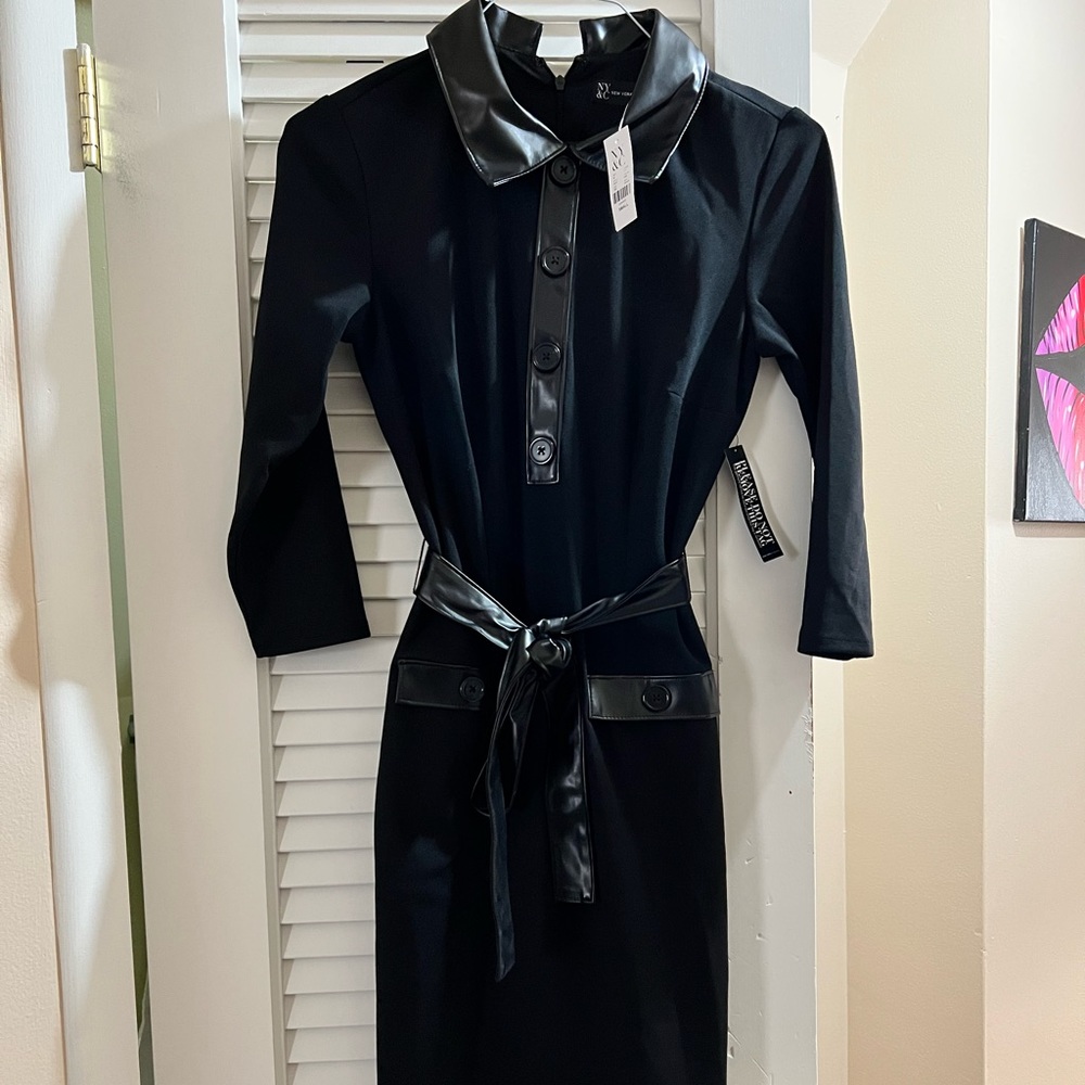 Brand new dress with faux leather accents.